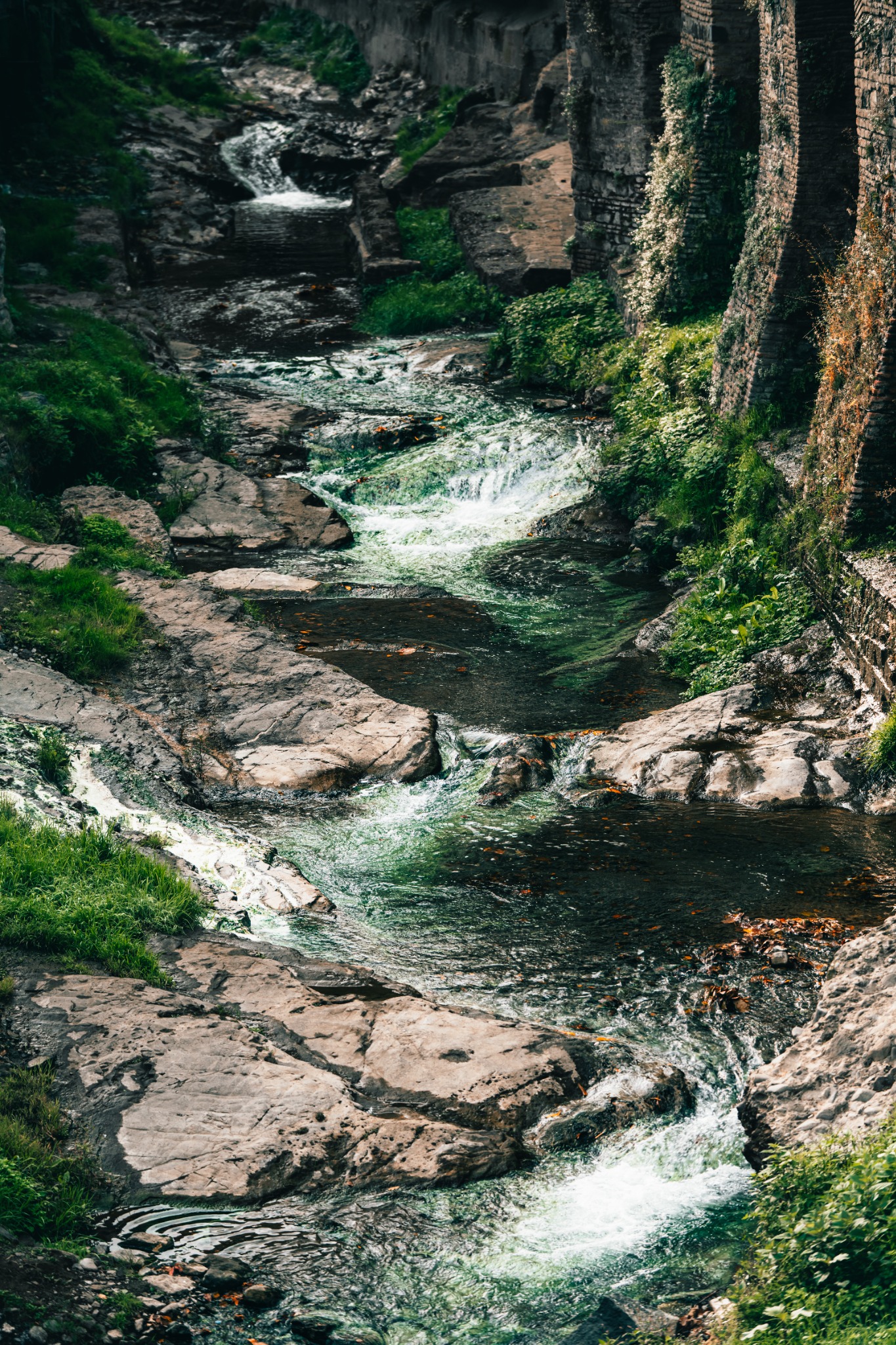 River Silence — landscape with arches and flowing water